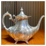 Hampton Court, Shields by Reed and Barton, including a teapot, covered sugar, and an open creamer; t