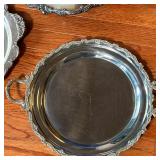 Including a Reed & Barton tray, a shallow bowl (dia. 13 in.), and a round serving dish with handles