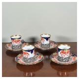 (8pc) AYNSLEY DEMITASSE CUPS & SAUCERS | A set of four Aynsley England silver demitasse cups with st