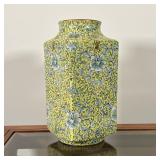 FAMILLE JAUNE VASE | Having flowers and leaves on a yellow background, signed "Y.Y. Japanese." decor