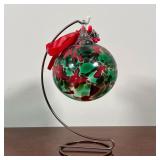 BLOWN GLASS CHRISTMAS ORNAMENT | On a hanging display stand, red and green blown glass, - h. 5 in. (