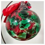 BLOWN GLASS CHRISTMAS ORNAMENT | On a hanging display stand, red and green blown glass, - h. 5 in. (