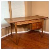 desk with a half bank of two drawers and fold out / sliding extending side, on tapering legs - h. 29