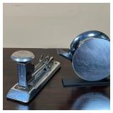 chrome tape dispenser (h. 4-1/4 in.), a vintage Pilot stapler, and a Linden quartz desk clock