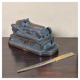 (2pc) DESK ARTICLES | Including a brass letter opener (l. 9 in.) and a bronze-style composition box 