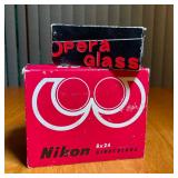 PAIR NIKON & OPERA GLASS BINOCULARS | Nikon 8 x 24 binoculars with travel bag and lens cloth, and Op