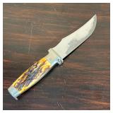 knife with a horn style handle and a separate axe head, possibly able to attach to the handle - l. 9