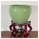 GREEN PLANTER ON STAND | Cream glazed pottery planter all cracked ice design, on a nice wooden stand