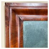 ANTIQUE WALL MIRROR | A veneered frame with antique glass - h. 27 x w 21 in.