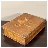 box inlaid with contrasting wood, designed in the form of a book, the lid with an urn with a flower 