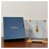 JAEGER-LE COULTRE CLOCK | Small lucite and brass mantle clock, having bullet hour markers, with orig