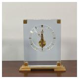 lucite and brass mantle clock, having bullet hour markers, with original box - h. 7-3/4 x 7-1/8 in.