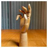 CARVED WOOD ARTICULATED HAND | Having five articulating fingers and a movable wrist on a weighted ba