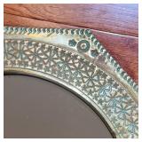OCTAGONAL BRASS MIRROR | Round mirror within in an octagonal brass frame with patina - dia. 12-1/8 i