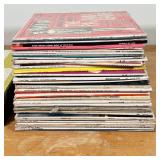 vinyl record albums, primarily show tunes and classical selections, among others; including "My Name