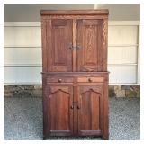 ANTIQUE COUNTRY CUPBOARD  | Of two-piece construction, the top section with double cabinet doors wit