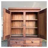 cabinet doors with vintage hardware, the lower section with two drawers over double cabinet doors, f