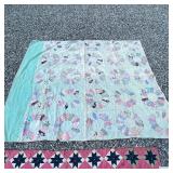 Including one with the pink ground and navy stars; one with the white ground with a small floral pri