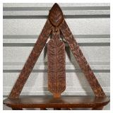 Single wall shelf on a carved openwork diamond-form frame, American, late 19th/early 20th century, w