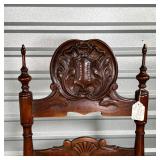 CARVED SHIELD ARMCHAIR  | 19th century, carved wood armchair crested by an intricately carved shield