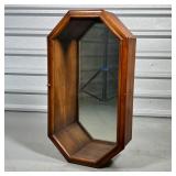 OCTAGONAL WOOD DISPLAY CASE  | Having a mirrored interior and a single glaze glass door, with "Butle