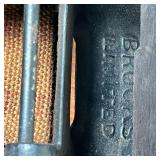 Brooks Limited, London arts & crafts satinwood piano stool, having a padded black leather top with b