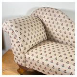 American antique chaise/fainting lounge of small size, with overall tulip, patterned upholstery, on 