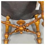 French foot stool, circa 19th century, with a black upholstered cushioned top with pink floral motif