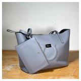 Ferragamo gray leather handbag with suede interior and inner coin purse, still with plastic on the z