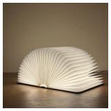 LUMIO SF PORTABLE LAMP  | Multi-functional portable lamp that folds into a wooden bound book.