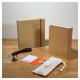 LUMIO SF PORTABLE LAMP  | Multi-functional portable lamp that folds into a wooden bound book.