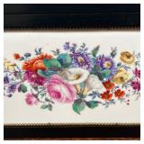Showing a spray of various colorful flowers on a white ceramic background - w. 17 x h. 8 in. (frame)