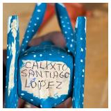 animal figures, signed on the bottom, "CALIXTO SANTIAGO LOPEZ"; plus instruments, including a pair o