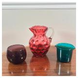 (3pc) COLORFUL BLOWN GLASS  | Including a textured pitcher, a purple vase, and a green glass beaker 