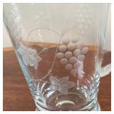 (3pc) CUT GLASS ITEMS  | Blown and/or cut clear glass, including two pitchers and a lidded jar - h. 