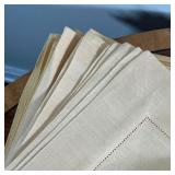 (22pc) TAUPE LINEN PLACEMATS  | A set of orange-taupe colored placemats - w. 18 x h. 13 in.