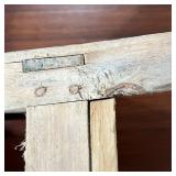 pegged construction with reeded spindles, signed on the bottom "HBL" ; seat height 17.5 in. - l. 17 