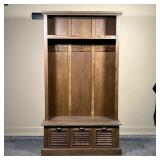 GRAY STAINED MUDROOM UNIT  | Wood hall tree with hooks for coats, an upper open shelf, and three low
