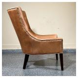 POTTERY BARN LEATHER ARMCHAIR  | Distressed brown leather with a tufted back - l. 29 x w. 31.5 x h. 