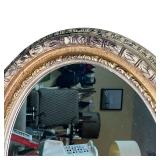 FANCY OVAL WALL MIRROR  | Bombay Company, carved framed mirror with metallic accents - w. 26 x h. 33