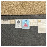 "Classic Wool Border Rug" in graphite color having a beige field within a wide gray border, made in 