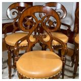 bar stools with dark wood and contrasting edges, having scrolled backrests and armrests, padded ligh