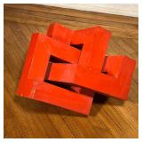 CONTEMPORARY WOOD SCULPTURE  |  Intertwined cubic elements, painted red - l. 22 x h. 13 in. (approx)