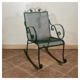 OUTDOOR ROCKING CHAIR  |  Woodard-style, green painted metal with scrolled arms and leaf crest - l. 