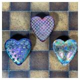 (3pc) ROBERT HELD ART GLASS  |  Small iridescent art glass hearts, each signed on the bottom - l. 2.