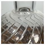 BACCARAT VASE  |  Crystal glass vase of bulbous form with smooth cut ribbed swirls, signed on the bo