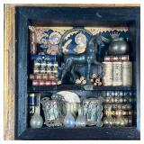 Shadowbox frame decorated with miniature books, scrolls, a bronze horse glassware, framed prints of 