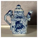 small lidded jar with floral decoration, with seal mark and "World Monitor" label on bottom (h. 7.5 