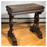 FANCY GAMES TABLE  |  Ornately carved wooden games table with chessboard top - l. 28 x w. 18.5 x h. 
