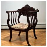 ANTIQUE ARM CHAIR  |  Carved reserve, needlepoint seat - l. 19 x w. 25 x h. 35 in.